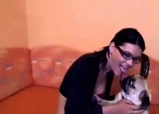 Brunette doll gets to get off with her doggo