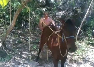 Dude uses his cock to fuck a mare from behind